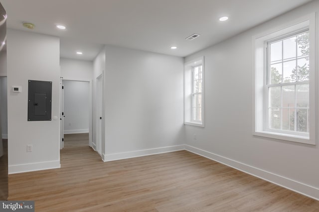 1801 Otis St NE Unit 6, Washington, DC 20018 - unfurnished room featuring electric panel, light wood-style flooring, a smoke detector, and recessed lighting