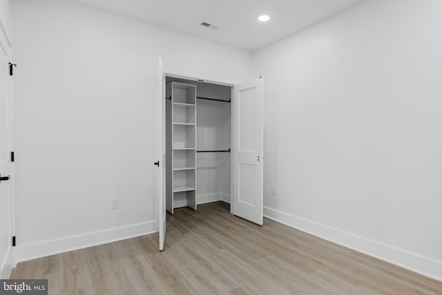 1801 Otis St NE Unit 6, Washington, DC 20018 - unfurnished bedroom with light wood finished floors, a closet, and recessed lighting