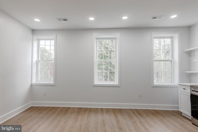 1801 Otis St NE Unit 6, Washington, DC 20018 - unfurnished room featuring light wood-style flooring, plenty of natural light, and recessed lighting