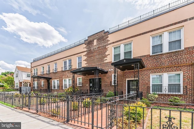 1801 Otis St NE Unit 6, Washington, DC 20018 - townhome / multi-family property featuring brick siding