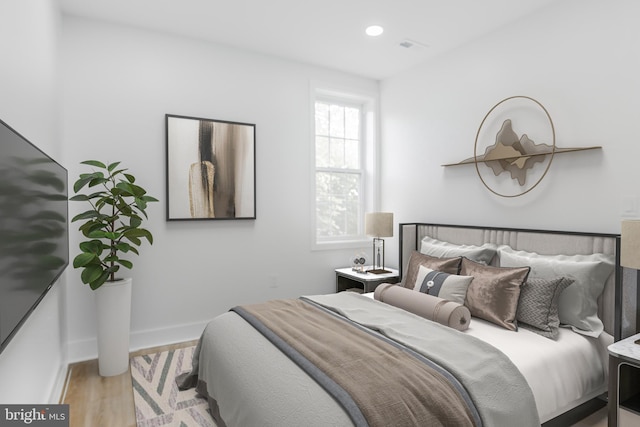 1801 Otis St NE Unit 6, Washington, DC 20018 - bedroom with light wood finished floors and recessed lighting