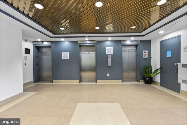 lobby featuring recessed lighting and wooden ceiling