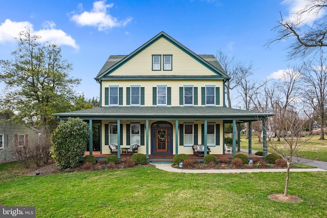 16 Glyndon Ave, Glyndon, MD 21071 - farmhouse with a porch, a front lawn, and roof with shingles