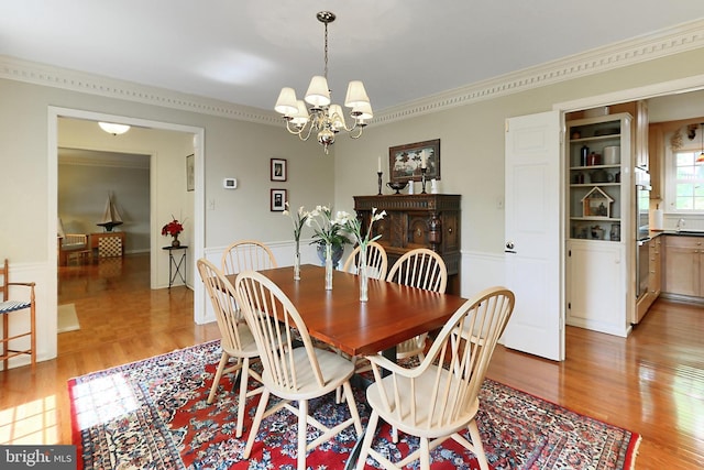 4614 Demby Dr, Fairfax, VA 22032 - dining space featuring a chandelier, ornamental molding, and light wood finished floors