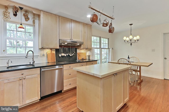 4614 Demby Dr, Fairfax, VA 22032 - kitchen with stainless steel dishwasher, a sink, light brown cabinetry, under cabinet range hood, and light wood finished floors
