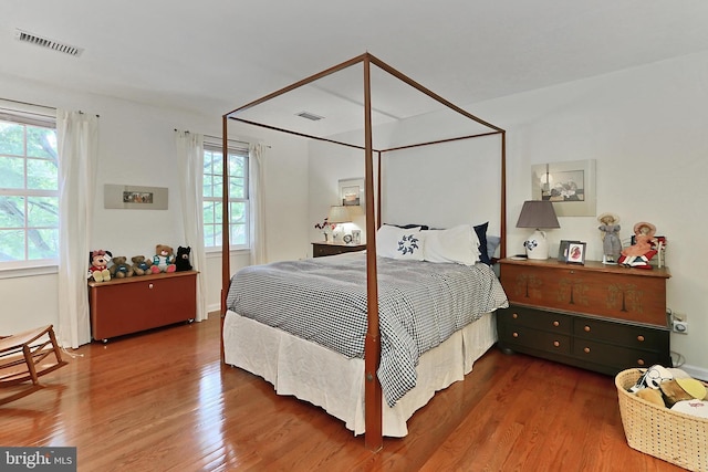 4614 Demby Dr, Fairfax, VA 22032 - bedroom with multiple windows and wood finished floors