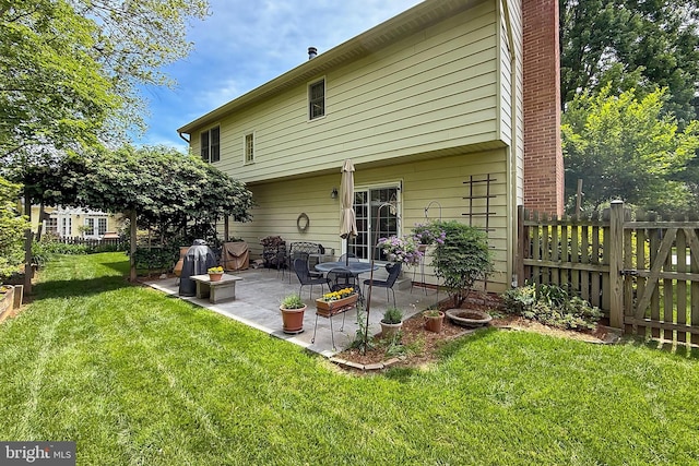 4614 Demby Dr, Fairfax, VA 22032 - rear view of property with a patio area and a chimney