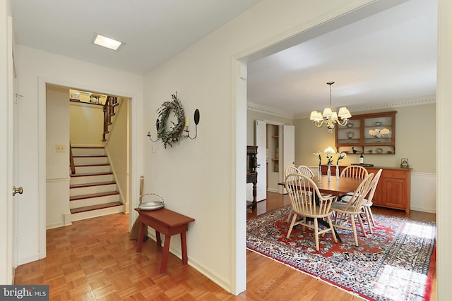 4614 Demby Dr, Fairfax, VA 22032 - dining space featuring stairway, a chandelier, crown molding, and baseboards