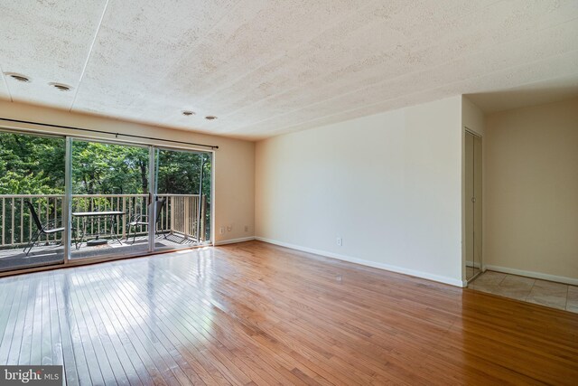 5707 Indian Ct Unit 31, Alexandria, VA 22303 - unfurnished room featuring hardwood / wood-style flooring and baseboards