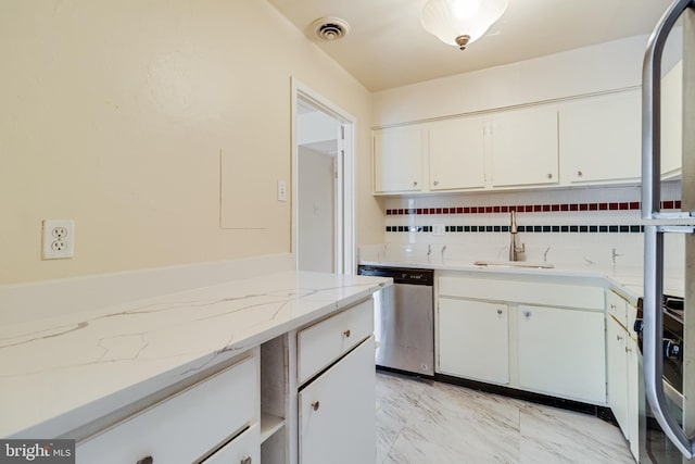 5707 Indian Ct Unit 31, Alexandria, VA 22303 - kitchen with dishwasher, white cabinetry, a sink, and light stone counters