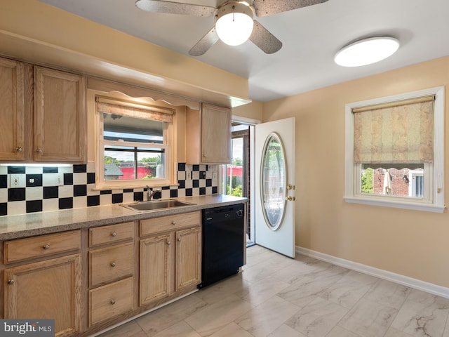 kitchen with dishwasher, a sink, backsplash, baseboards, and light marble finish flooring