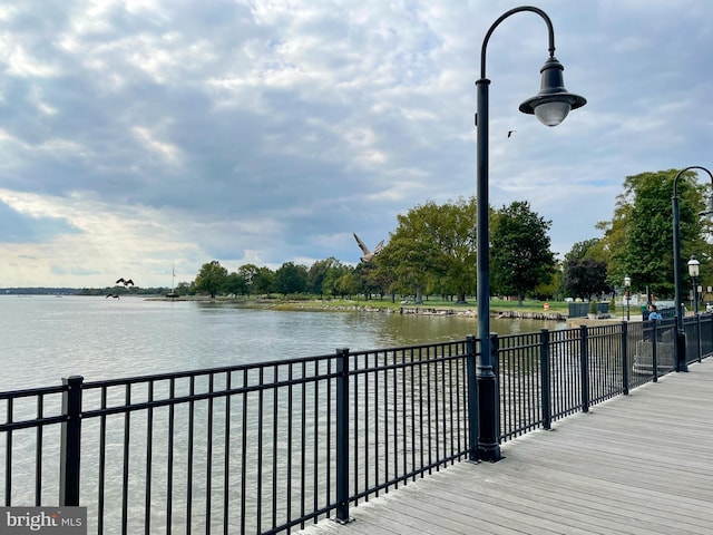 216 N Heron Ln, New Castle, DE 19720 - wooden deck featuring fence and a water view