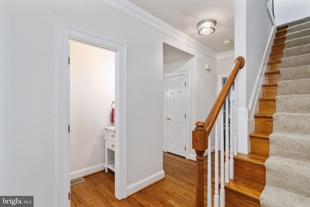 3910 Corbin Hall Ln, Fredericksburg, VA 22408 - staircase with baseboards, ornamental molding, and wood finished floors