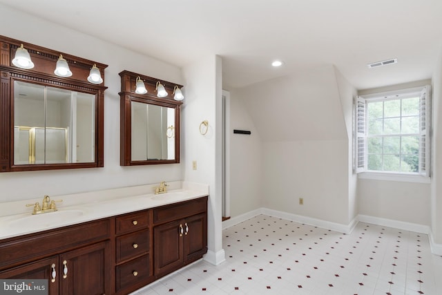 3910 Corbin Hall Ln, Fredericksburg, VA 22408 - bathroom featuring double vanity, baseboards, vaulted ceiling, an enclosed shower, and recessed lighting