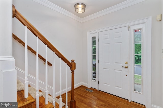 3910 Corbin Hall Ln, Fredericksburg, VA 22408 - foyer with crown molding, wood finished floors, stairs, and baseboards