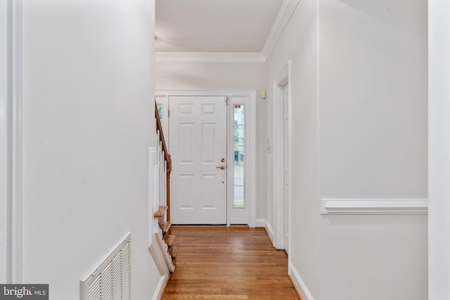 3910 Corbin Hall Ln, Fredericksburg, VA 22408 - foyer entrance featuring ornamental molding, light wood-style flooring, and baseboards