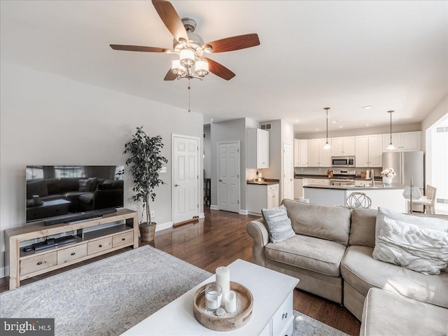 403 Joshua Ln, Middletown, DE 19709 - living area with a ceiling fan, dark wood-type flooring, recessed lighting, and baseboards