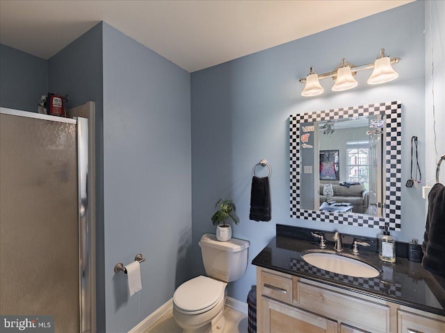 403 Joshua Ln, Middletown, DE 19709 - full bath with ensuite bath, toilet, vanity, baseboards, and a shower