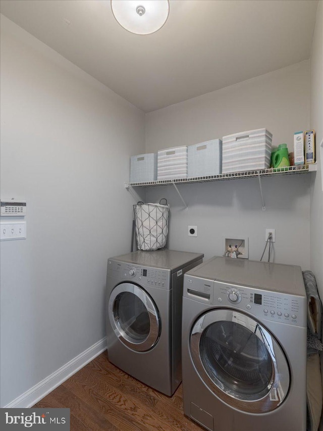 403 Joshua Ln, Middletown, DE 19709 - clothes washing area featuring wood finished floors, washing machine and dryer, and baseboards