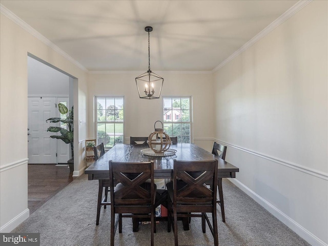 403 Joshua Ln, Middletown, DE 19709 - carpeted dining space featuring crown molding, a chandelier, and baseboards