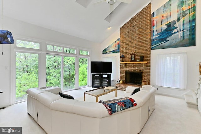8265 Private Ln, Annandale, VA 22003 - living room with a ceiling fan, light carpet, high vaulted ceiling, and a fireplace