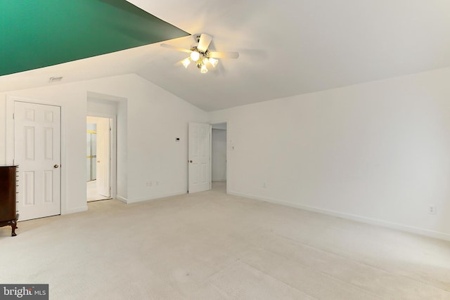 8265 Private Ln, Annandale, VA 22003 - unfurnished bedroom featuring light colored carpet, lofted ceiling, baseboards, and ceiling fan