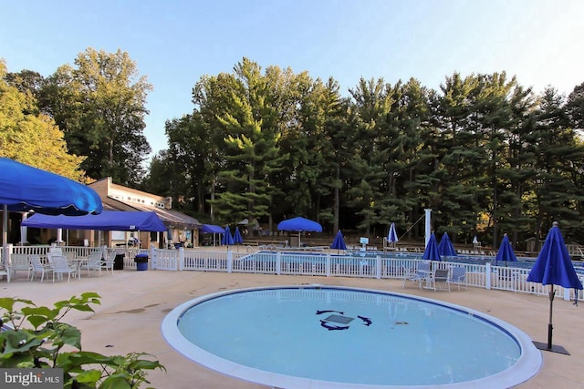 8265 Private Ln, Annandale, VA 22003 - community pool with fence and a patio area