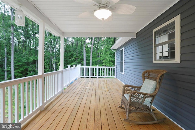 wooden deck with ceiling fan