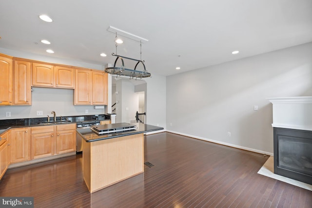713 Norfolk Ln, Alexandria, VA 22314 - kitchen with a sink, stainless steel appliances, a kitchen island, dark countertops, and recessed lighting