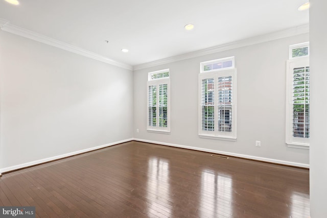 713 Norfolk Ln, Alexandria, VA 22314 - empty room with dark wood-style flooring, ornamental molding, recessed lighting, and baseboards