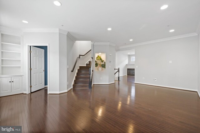 713 Norfolk Ln, Alexandria, VA 22314 - unfurnished living room with ornamental molding, stairs, recessed lighting, hardwood / wood-style floors, and baseboards