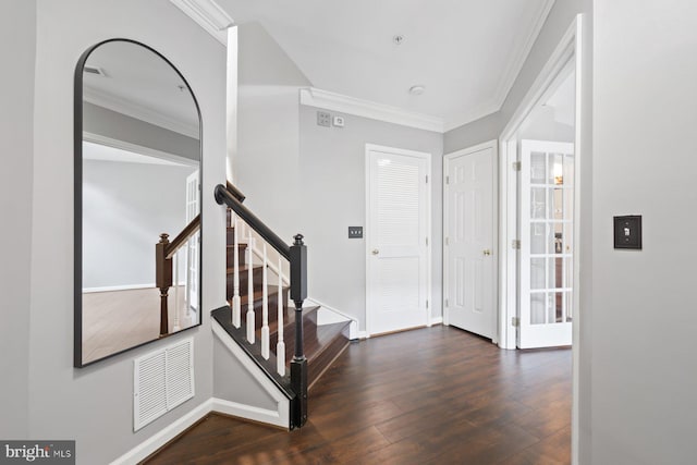 713 Norfolk Ln, Alexandria, VA 22314 - entrance foyer with crown molding, dark wood-type flooring, baseboards, and stairs