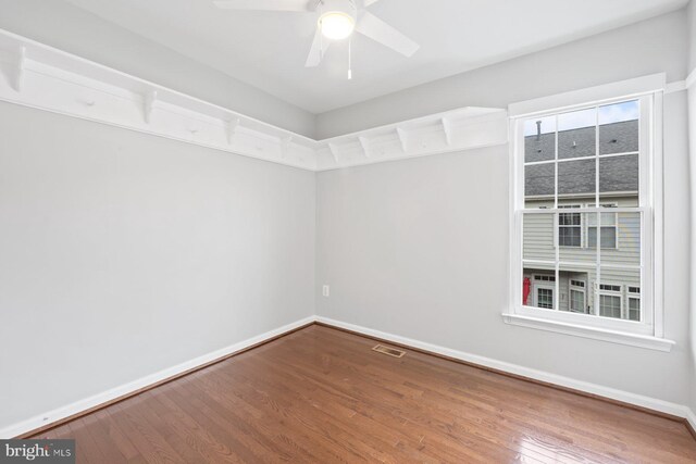 713 Norfolk Ln, Alexandria, VA 22314 - spare room featuring wood finished floors, baseboards, and a ceiling fan