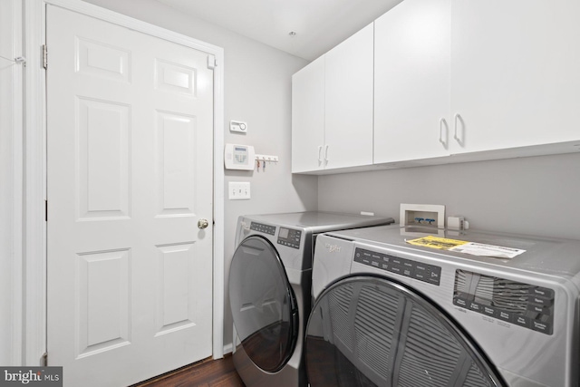 713 Norfolk Ln, Alexandria, VA 22314 - clothes washing area with cabinet space, independent washer and dryer, and dark wood finished floors