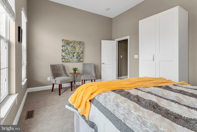 3911 Fleet St, Baltimore, MD 21224 - bedroom featuring light colored carpet and baseboards