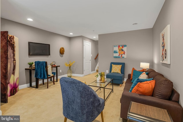3911 Fleet St, Baltimore, MD 21224 - living room with light colored carpet, recessed lighting, baseboards, and stairs