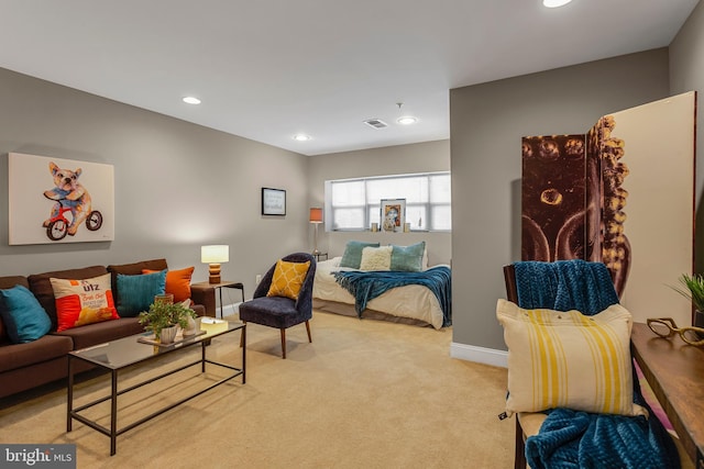 3911 Fleet St, Baltimore, MD 21224 - living room featuring light carpet, recessed lighting, and baseboards