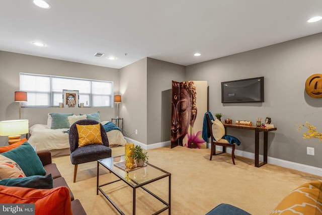 3911 Fleet St, Baltimore, MD 21224 - living room with light colored carpet, recessed lighting, and baseboards