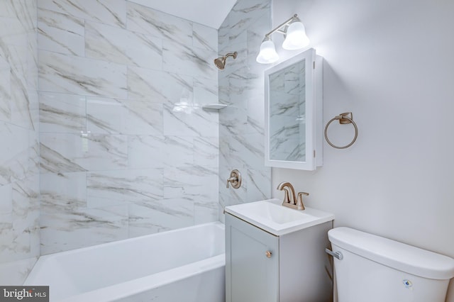 bathroom with toilet, vanity, and bathtub / shower combination