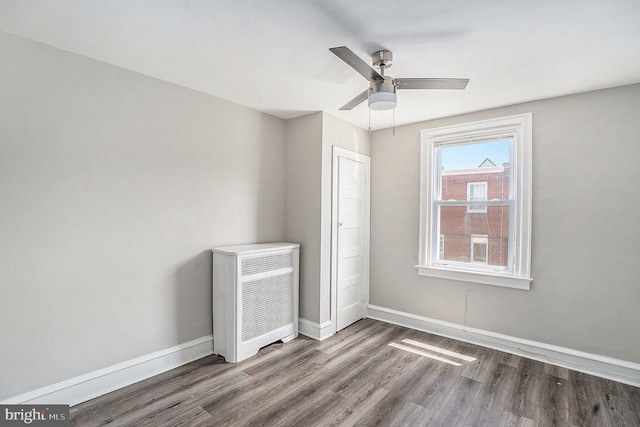 128 Linton St, Philadelphia, PA 19120 - unfurnished bedroom featuring wood finished floors, baseboards, and a ceiling fan