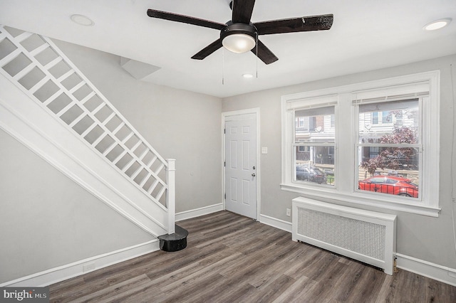 128 Linton St, Philadelphia, PA 19120 - foyer entrance featuring radiator heating unit, baseboards, wood finished floors, and recessed lighting
