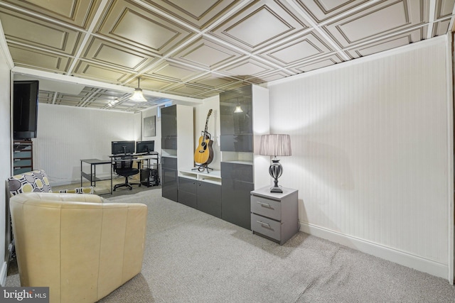 carpeted living area with an ornate ceiling and an office area