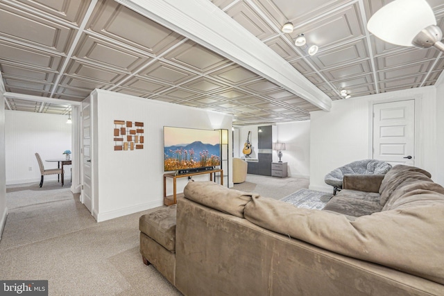 living area with an ornate ceiling, baseboards, and light carpet