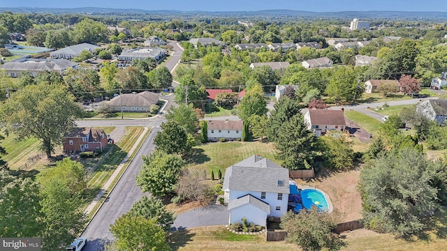 aerial perspective of suburban area with a pool area