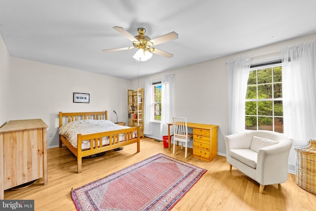 11 Oleander Ct, Lawrenceville, NJ 08648 - bedroom with wood finished floors, baseboards, and ceiling fan