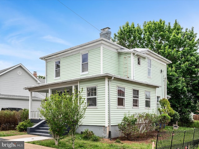 19 W Jackson St, Front Royal, VA 22630 - view of side of property featuring a chimney