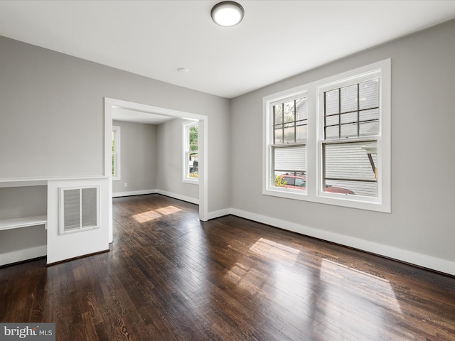 19 W Jackson St, Front Royal, VA 22630 - spare room with healthy amount of natural light, wood-type flooring, and baseboards