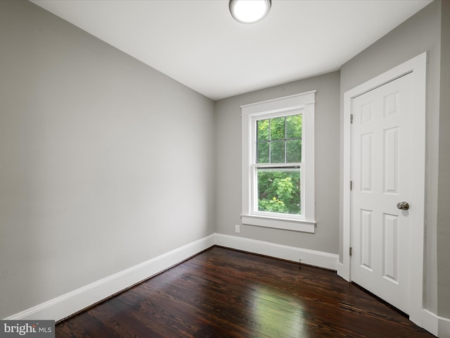 19 W Jackson St, Front Royal, VA 22630 - spare room with baseboards and dark wood-type flooring