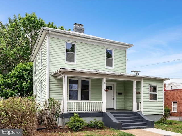 19 W Jackson St, Front Royal, VA 22630 - view of front of property featuring covered porch and a chimney