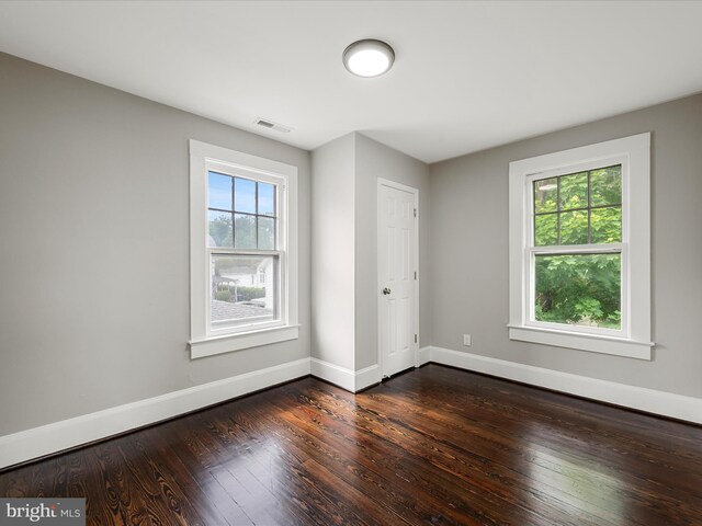 19 W Jackson St, Front Royal, VA 22630 - empty room featuring dark wood-style flooring and baseboards